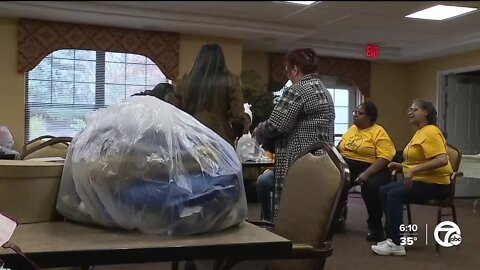 Seniors at Detroit nursing home make hats & gloves for the homeless