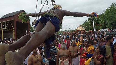 Huge festival features show of devotion that few could endure