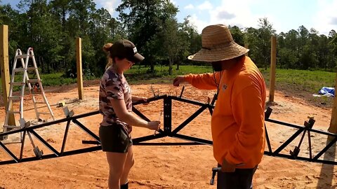 Polebarn Build pig house 4 | Topping off the poles and setting our steel truss