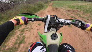 Low-speed KX250 Offroad build doing high-speed laps on a turn track!
