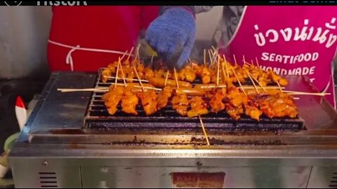 Grilled Stick​ Pork Intestines in Chiang Mai Walking Street, Thailand Street Food, ( 4K HD )