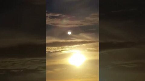 TWO suns And A Moon In The Sky