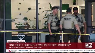 Police looking for suspect after one person shot in armed robbery in Anthem