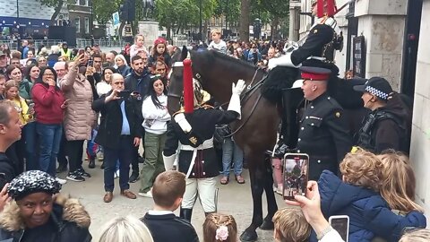 Female kings guards shouts 4 times at large crowed to make way #horseguardsparade