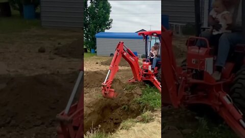 MOVING Dirt: Teaching them young how to play in the dirt with the big toys!