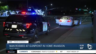 PB resident robbed at gunpoint in home invasion