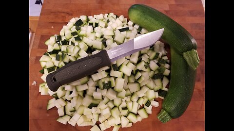 Dehydrating Zucchinis using a Mora Kansbol for the prep work