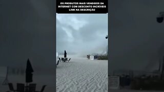 ventos violentos arrastam pessoas na praia