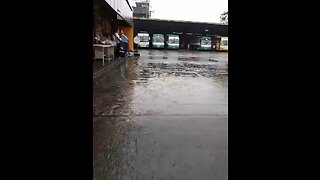 Walking to the bus in the Philippines rain