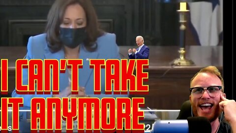I am Kamala Harris, my pronouns are she/her, and I am a woman sitting at the table wearing blue suit