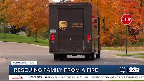 UPS driver rescues family from fire