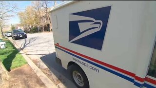 Suspects in custody after attempted robberies of postal employees