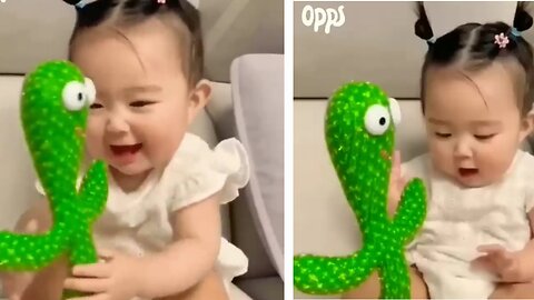 a cute baby playing | cute baby