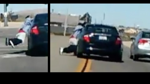 Man With Arms Rolled Up In Window Helplessly Dragged By Car [WATCH]