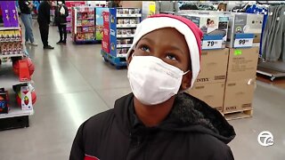 Lions take kids from Downtown Boxing Gym shopping for holidays