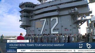 Holiday Bowl teams tour San Diego warship