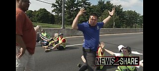 Angry drivers confront climate protesters blocking DC road Saturday