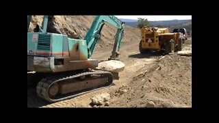 YB 451 Yanmar Excavator Moving Big Rocks