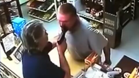 Fearless Store Clerk Halts Armed Robber In Seconds