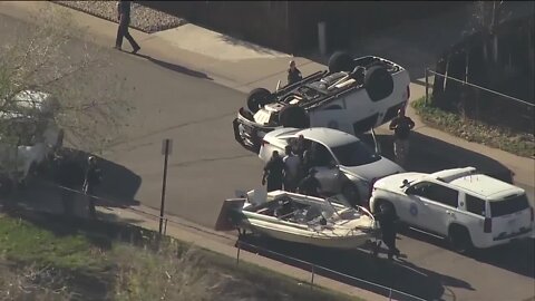 Denver police SUV rolls over during pursuit of shooting suspect