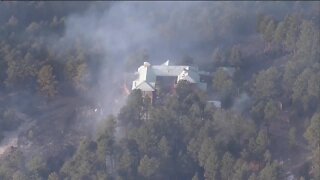 Mandatory evacuations downgraded as containment grows in Sunshine Wildland Fire