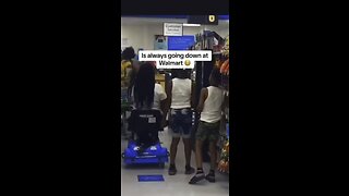 Black woman encourages her young sons to fight grown man at Walmart
