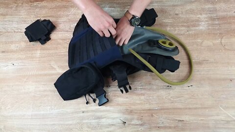 How To Use The Rain Hood, Pouch Liner & Water Bladder With The Onward Adventure Baby Carrier
