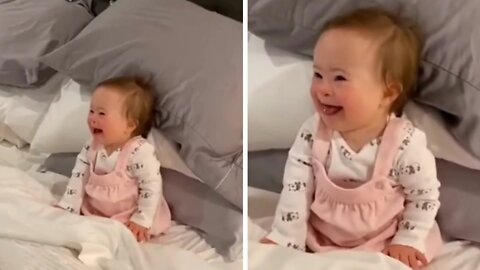 Baby With Down Syndrome Cannot Stop Giggling at Her Father