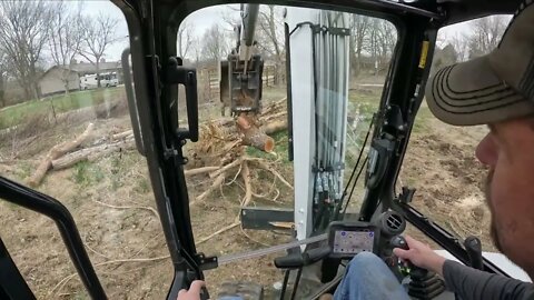 Can I grab 4 stumps at once with bobcat e42 R2 series mini excavator?