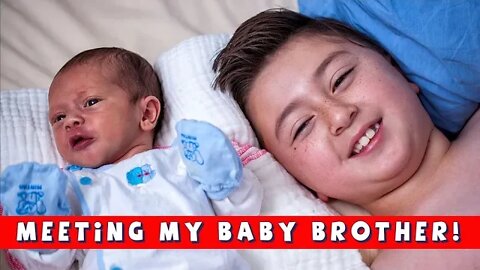 Big Brother Meets Newborn Baby