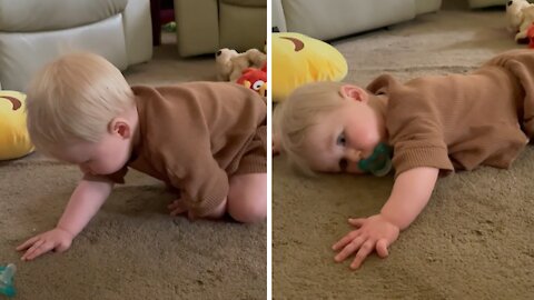 Tired Baby Isn't Quite Ready To Crawl Yet