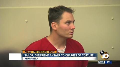 Sailor, girlfriend answer to charges of torture