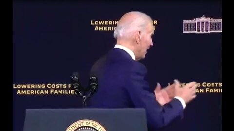 Moment Joe Biden shakes hands with air