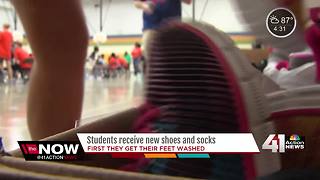400 KCPS students get feet washed along with new shoes, socks