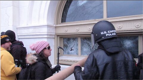 Close Up of Rachel Powell Breaking Glass on Capitol Windows With Ice Pick on Jan 6