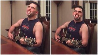 A guy sings while wearing a dental mouth opener and it's hilarious!