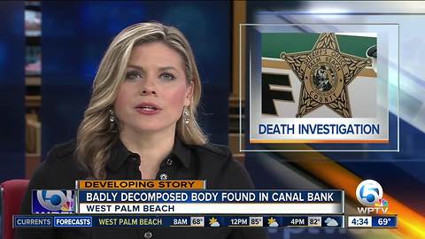 Badly decomposed body found along canal bank in suburban West Palm Beach