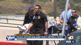 Police officer run over while writing a ticket