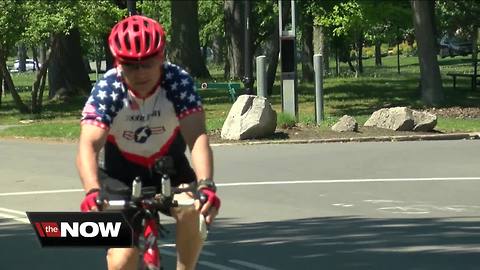 He's bicycling coast to coast for a good cause