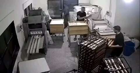 Israeli soldiers assault Palestinians at a bakery in the occupied West Bank.