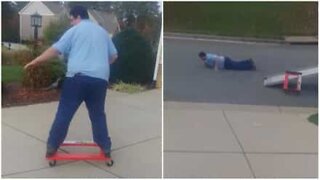 Epic fall after man rides improvised skateboard!