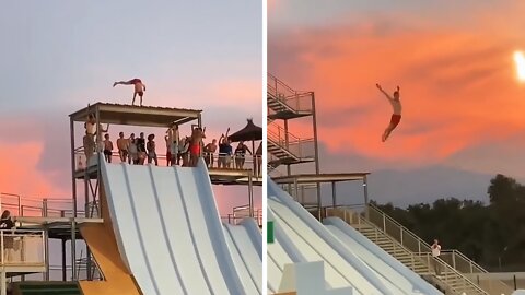 Daredevil jumps from roof of waterpark slide after doing a handstand