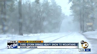 Third storm brings heavy snow to mountains