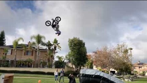 Eight-year-old boy does unexpected somersault on BMX