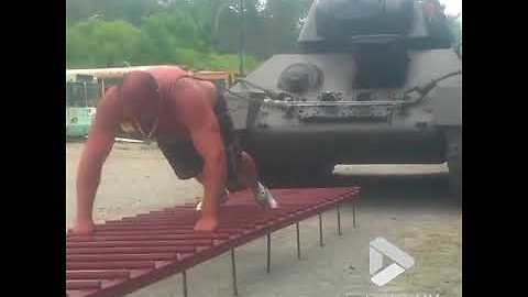 Strongman Shows Off Amazing Skills At Pulling Panzer T-34 Tank With Own Body Weight
