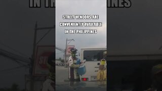 Street Vendors at traffic lights in The Philippines