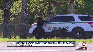 Large police presence conducts manhunt along Colonial Boulevard in Fort Myers