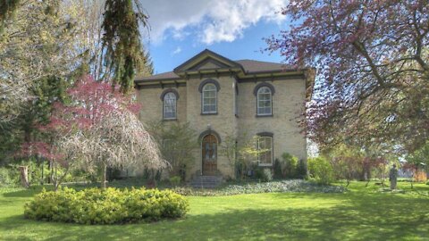 This $650K Ontario Home Has 2 Patios Surrounded By Fruit Trees & Major France Vibes