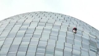 Man arrested after climbing skyscraper in Barcelona