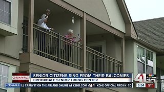 Senior Citizens sing from their balconies